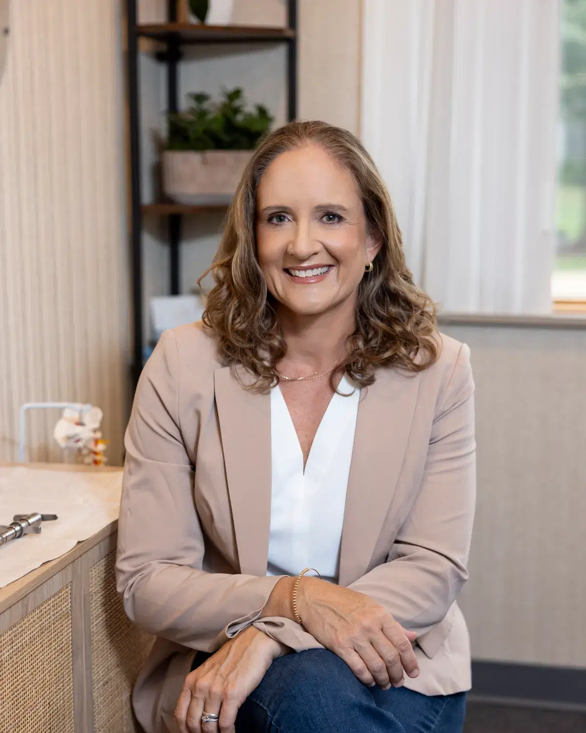 Dr. Jennifer Morrow in her treatment room at Mend Health